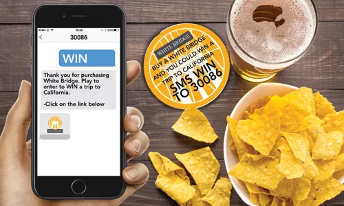 Friends around table with a mobile phone