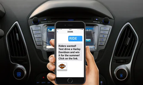 Friends around table with a mobile phone