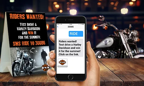 Friends around table with a mobile phone