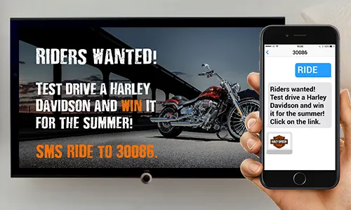 Friends around table with a mobile phone