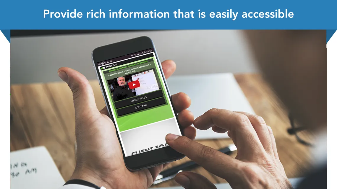 Friends around table with a mobile phone